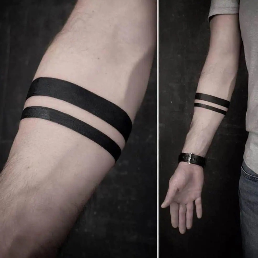 ¿Qué significa el tatuaje minimalista de una raya negra en el antebrazo?